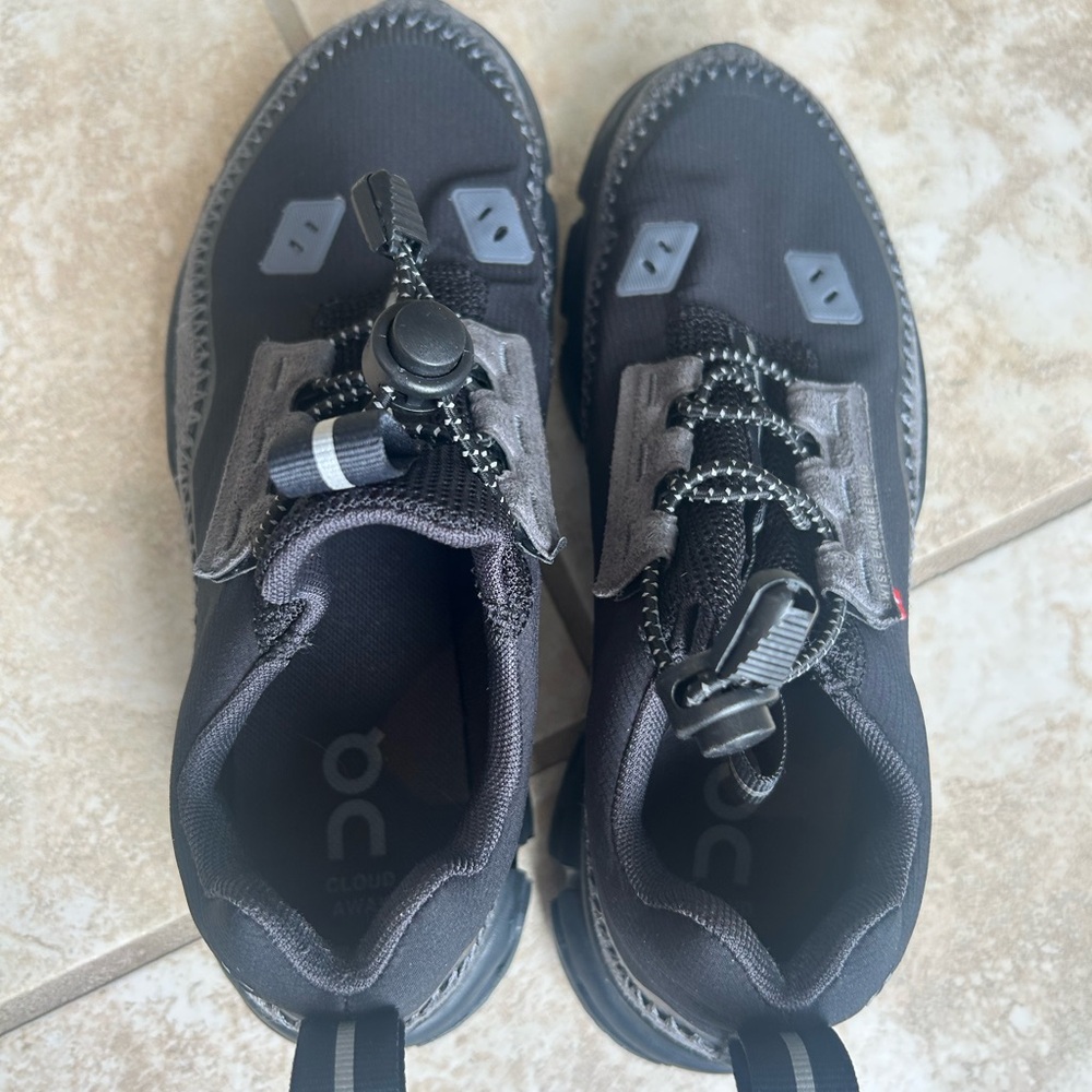 On Running Black and Gray Athletic Shoes